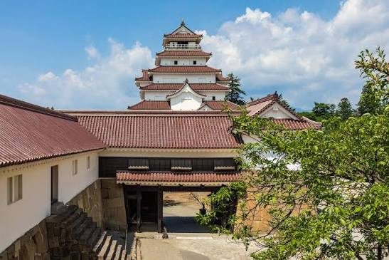 Tsurugajo Castle keep today, with its distinctive red roof tiles