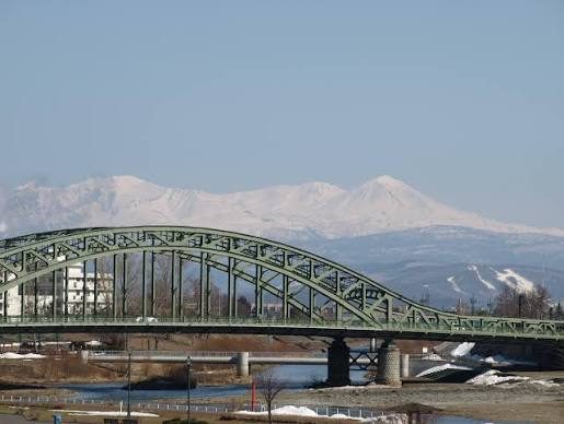 The arch of Asahi Bridge over the Ishikari River