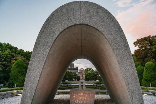 The cenotaph and the A-Bomb Dome in Peace Memorial Park