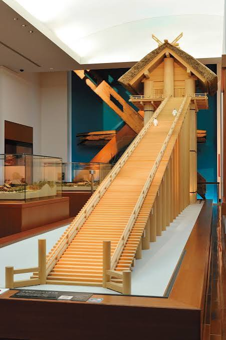 A reconstructed model of the colossal ancient Izumo Taisha hall, with a long stepped approach ramp leading up to it
