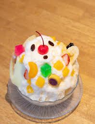 Shirokuma, Kagoshima's famous shaved ice, piled high with condensed milk and fruit