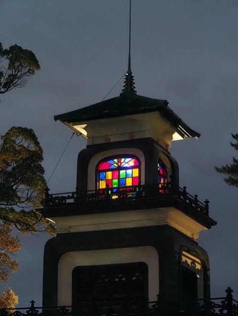 The gate of Oyama Shrine with stained glass on the top floor
