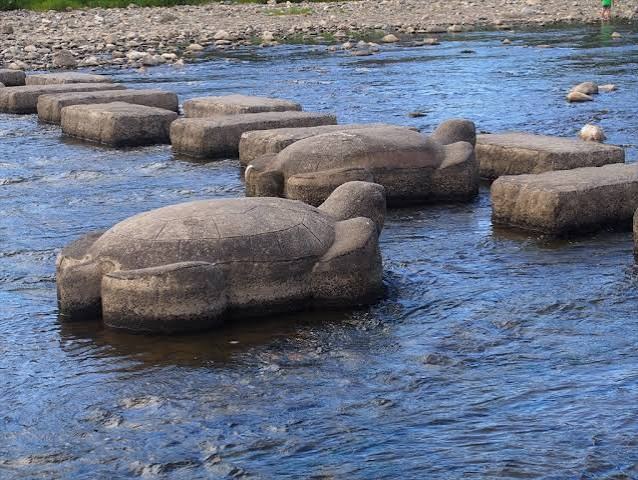The Kamo River delta at Demachiyanagi, where two rivers meet. The turtle stepping stones are a local playground.