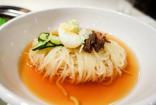 Morioka reimen topped with watermelon