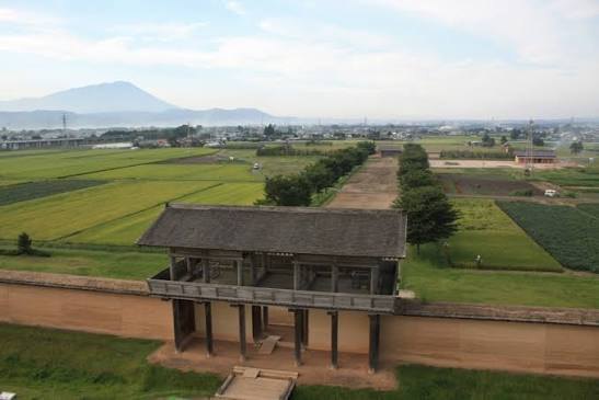 The reconstructed south gate and earthen walls of Shiwa Fort