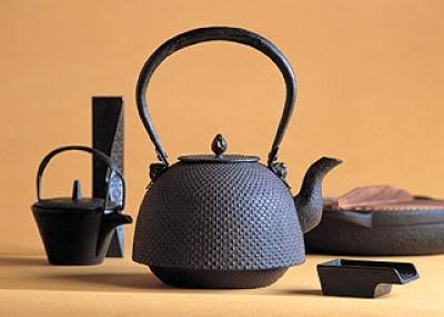 A Nanbu iron kettle with arare pattern