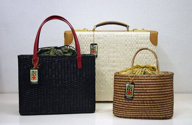 Three woven willow products: a tote bag, a case, and a drawstring basket