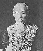 Portrait photograph of Sakurai Tsutomu in formal dress